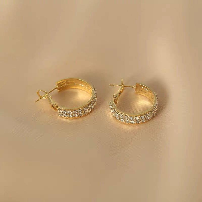 Calipso | Elegantes aretes con pedrería